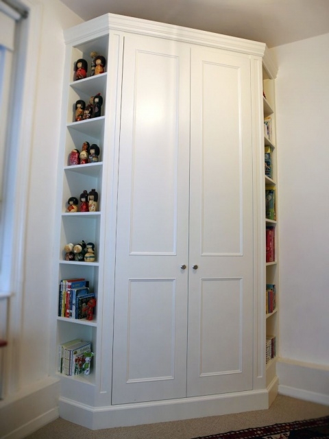 Attractive Corner Wardrobe Designs For Small Bedroom Images