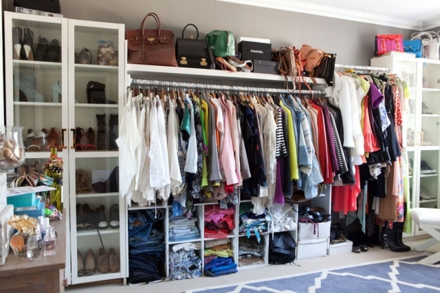 Luxurious Small Closet Lots Of Clothes Photo