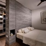 Luxurious Walk In Closet Behind Bed Image