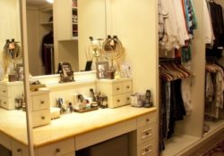 Stylish Walk In Closet With Makeup Area Photos